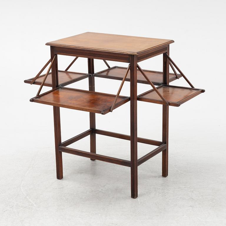 An English mahogany table, early 20th Century.