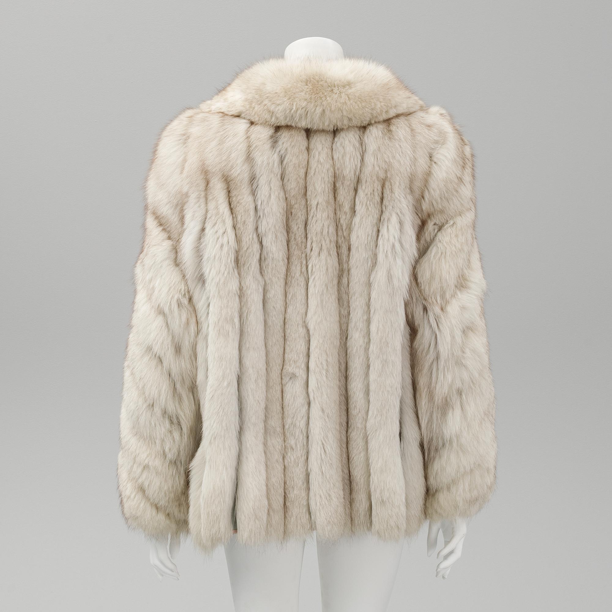 A Saga fox fur jacket, size L.