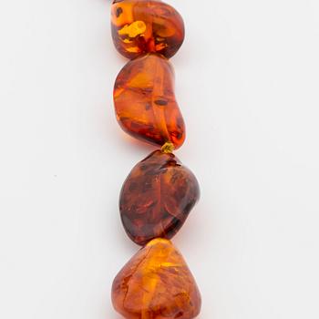 HALSBAND, bärnsten, doserat, ca 78 cm.