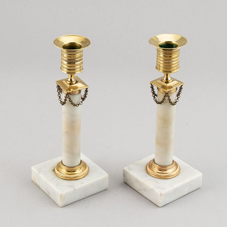 A pair of late-gustavian candlesticks, around year 1800.