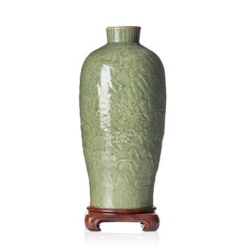 A carved celadon 'longquan' vase, Yuan/Ming dynasty.