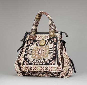 1390. A handbag by Gucci.