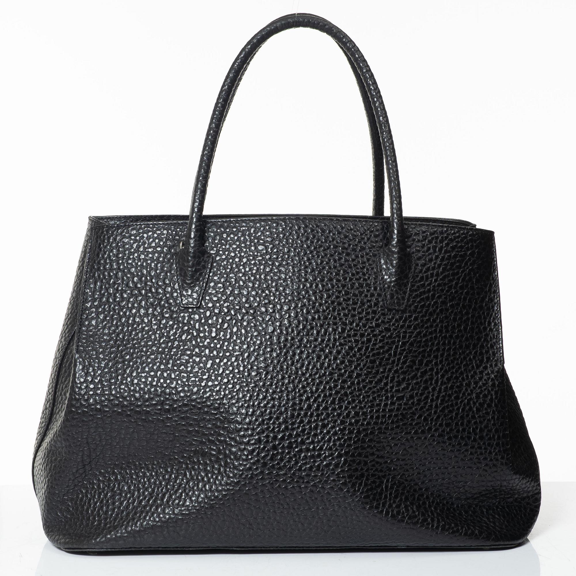 Jil Sander, A black leather bag.