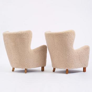 A pair of Danish Modern easy chairs, executed by cabinetmaker Peder Pedersen, Denmark 1940's.