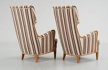 A pair of Nordiska Kompaniet armchairs, probably by Elias Svedberg, 1940's-50's.