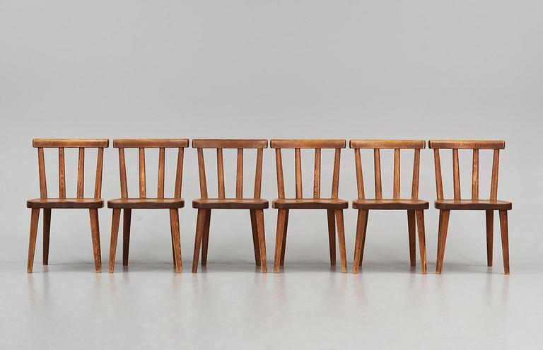 Axel Einar Hjorth, a set of six stained pine "Utö" chairs, Nordiska Kompaniet, Sweden, 1930s.