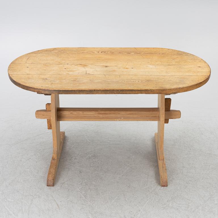A pine wood table, folk art, 19th century.