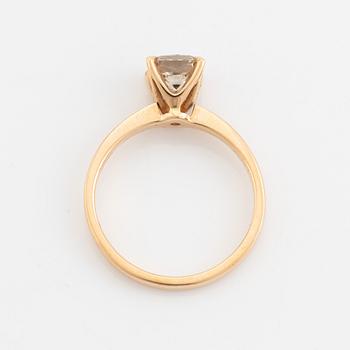 18K rose gold and radiant cut diamond ring.