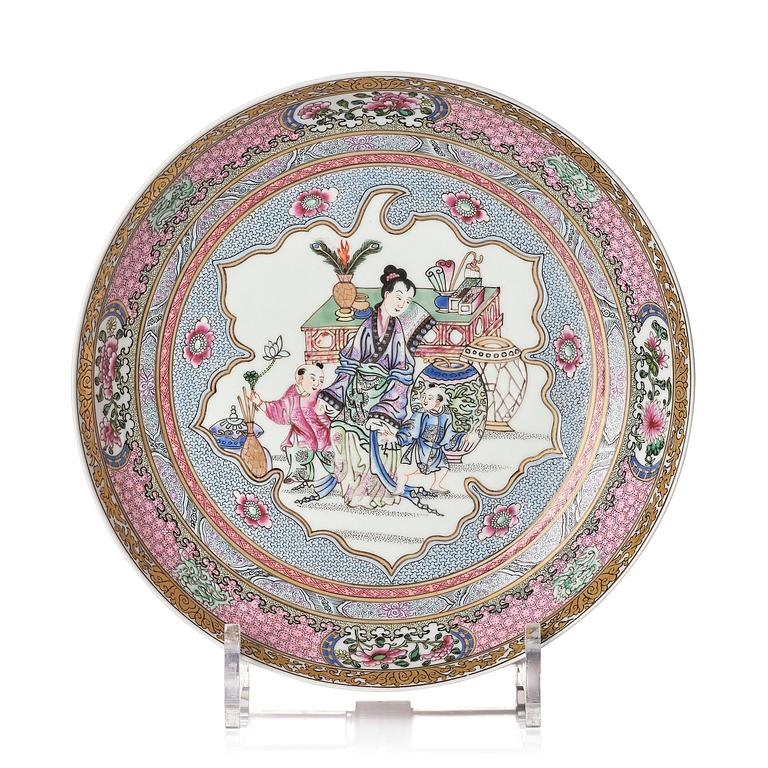 A Chinese famille rose 'ruby back' dish, 20th century.