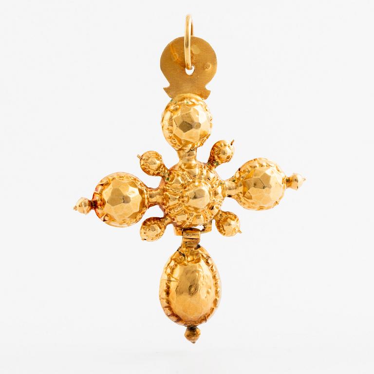Hängsmycke 18K guld i form av ett kors.