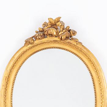 A Gustavian-style gilt-gesso mirror, early 20th century.