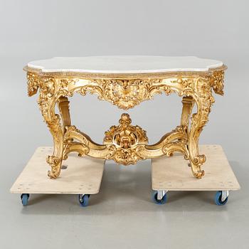 A Louis quinze style table from the later 19th century.