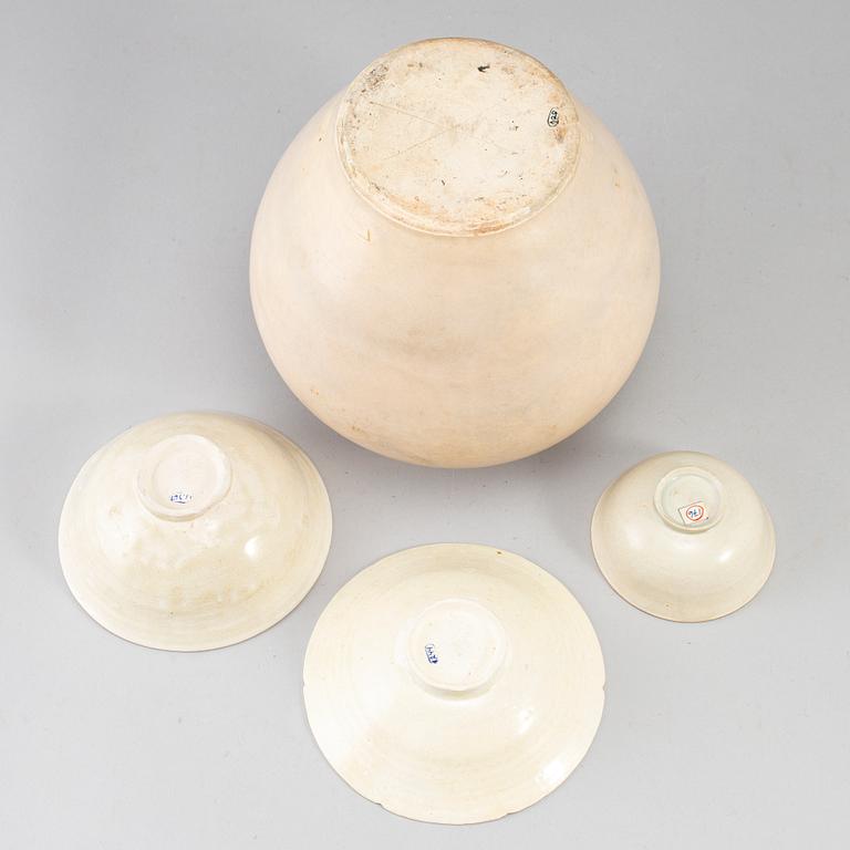 A group of white glazed South East Asian Ceramics, 20th Century or earlier. (4 pieces).
