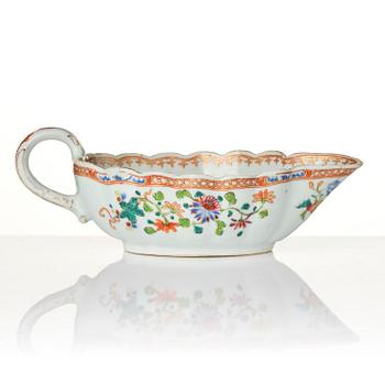 A group of famille rose 'double peacock' serving dishes, Qing dynasty, Qianlong (1736-95). (8 pieces).