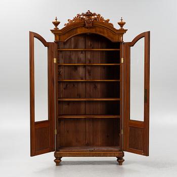 A mahogany veneered book cabinet ,second part of the 19th Century.