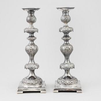 A pair of silver Sabbath candlesticks, Maker M. Sztern, Warsaw, Poland. Assayer Josef Sosnkowski, 1864. Weight 833 g.