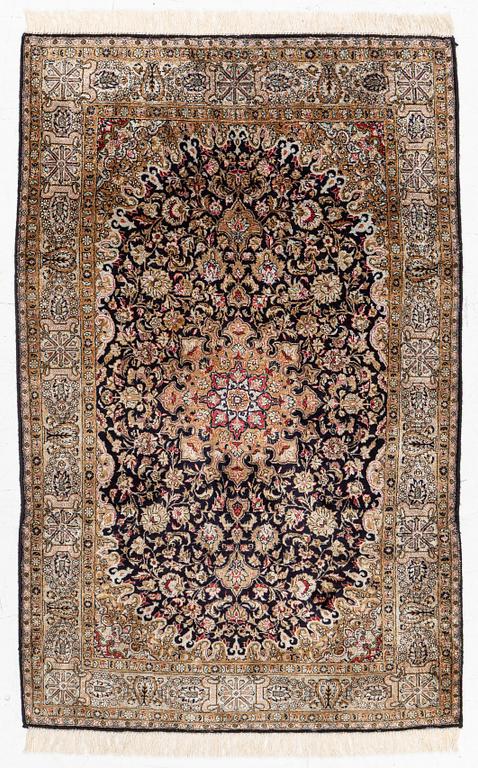 A Ghom, silk rug, c. 162 x 102 cm.