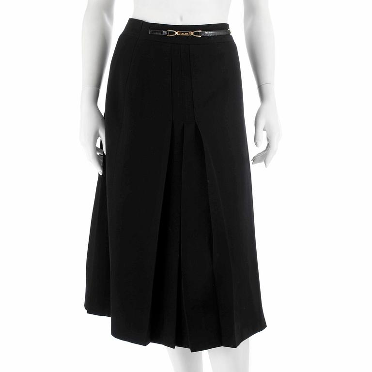 CÉLINE, a green wool skirt. Size 42.