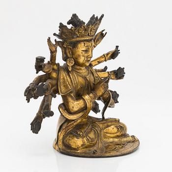 A gilt-bronze figure of a Boddhisattva, Ming dynasty (1638-1644).