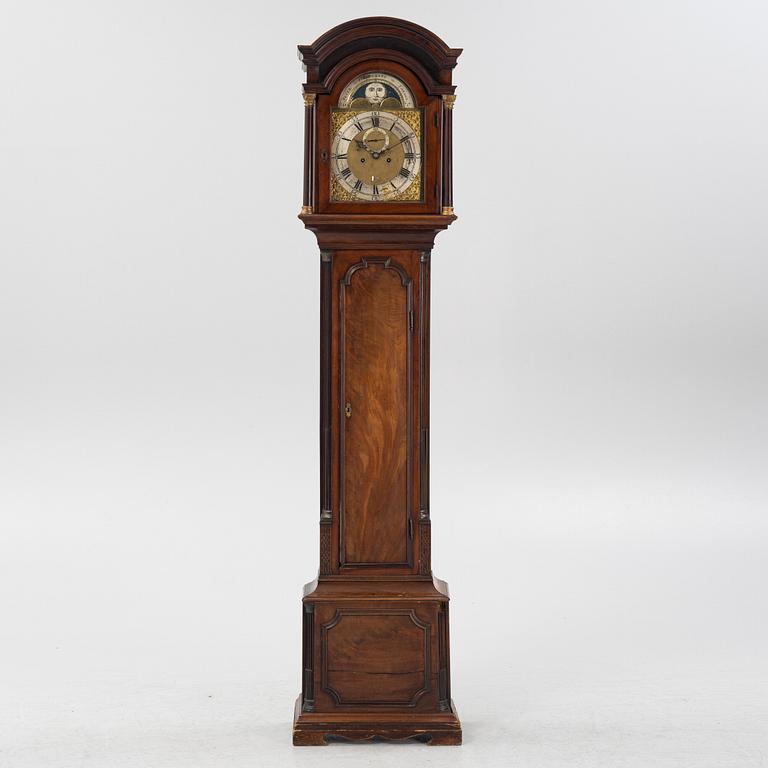 A mahogany veneered longcase clock, marked Peter Pohlmann, London, England, 18th century.