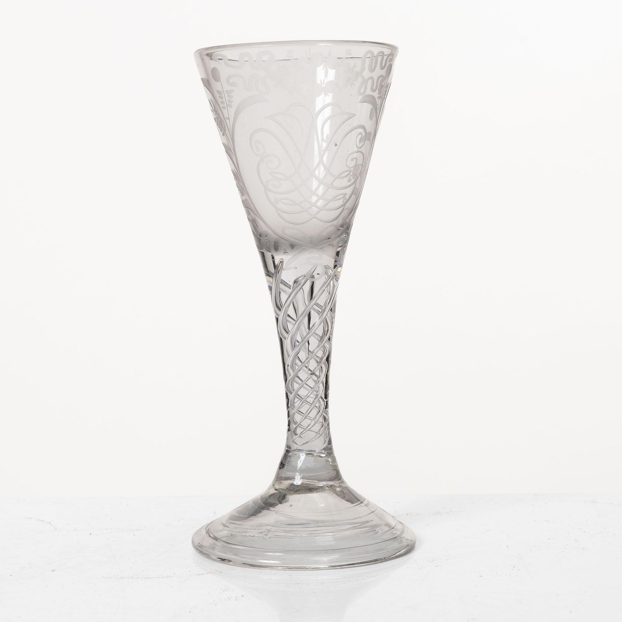 Three spiral-stemmed glasses, 18th Century.