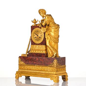 A French Empire ormolu and marble mantel clock 'à la sultane', first part of the 19th century.
