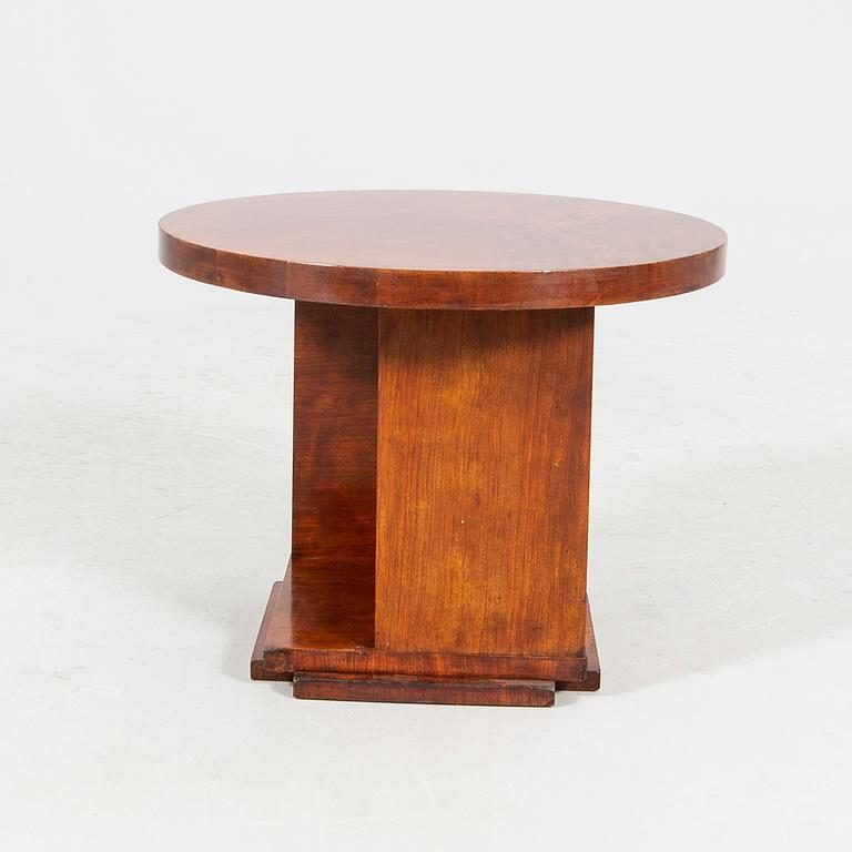 An Art Deco walnut coffee table.