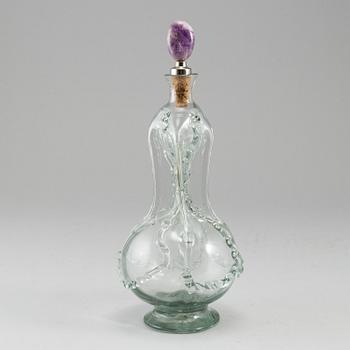 A glass bottle, 18/19th Century.