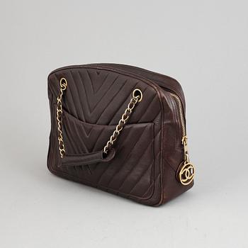 Chanel, a burgundy leather handbag, 1989-91.