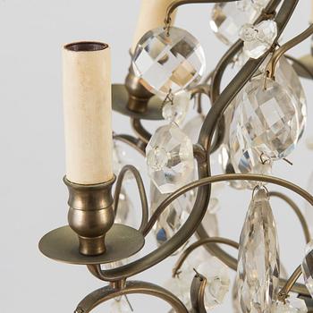 A rococo style chandelier, early 20th century.