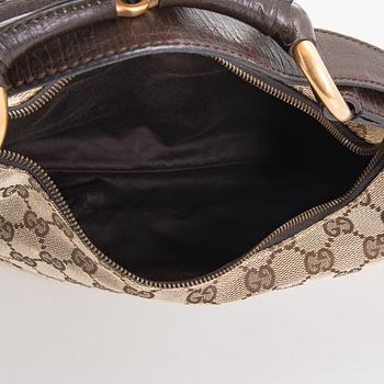 Gucci, a 'Horsebit GG Canvas Hobo Bag'.