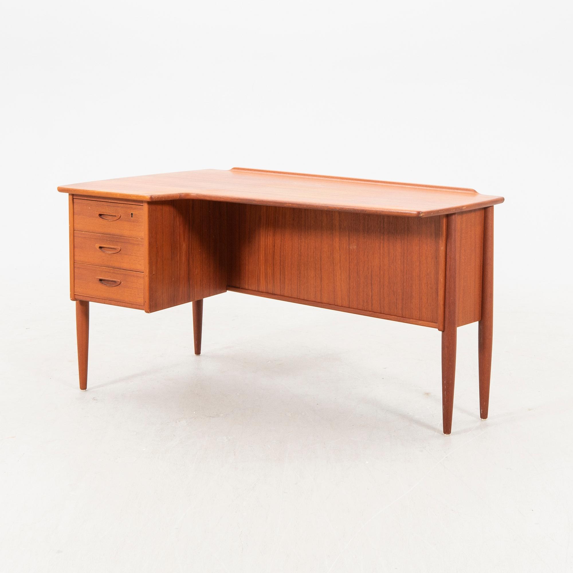 A 1950/560s teak desk from Lelångs mböelfabrik.