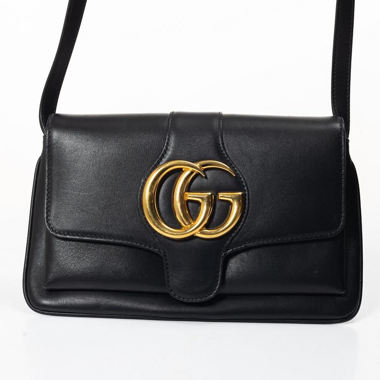 Gucci, a handbag.