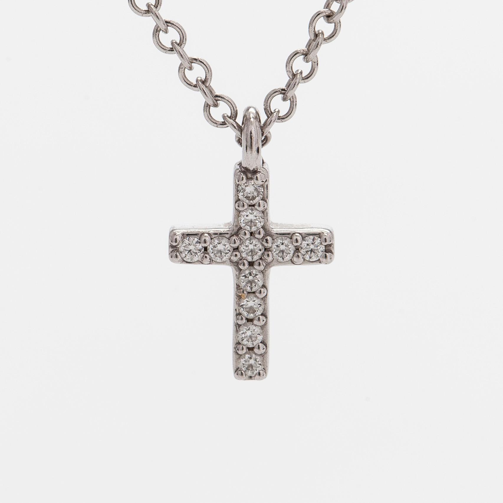 Tiffany & Co, an 18K white gold "Metro Cross" necklace with diamonds.