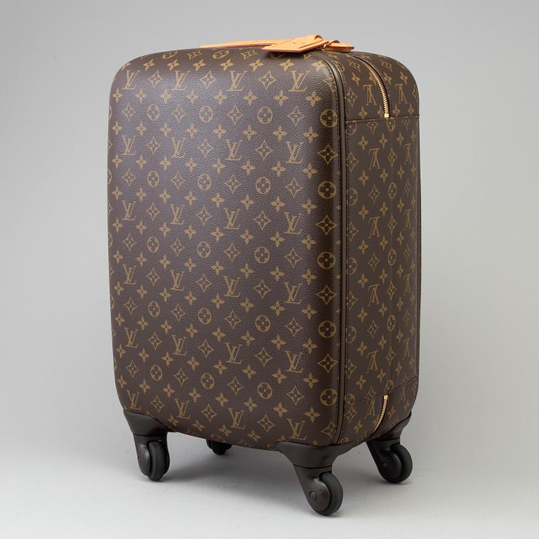 A Monogram Canvas "Zephyr" Suitcase by Louis Vuitton.