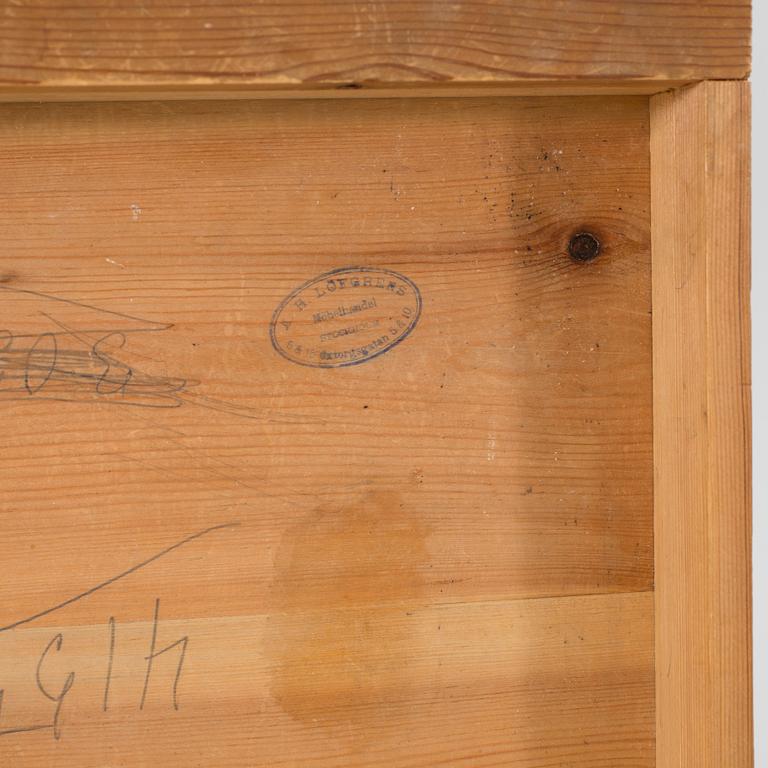 A walnut and mahogany bedside table, late 19th Century.
