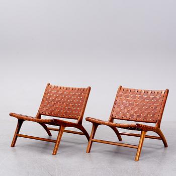 A pair of 'Porto' teak easychairs by Newport.