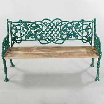 An early 20th century garden sofa.