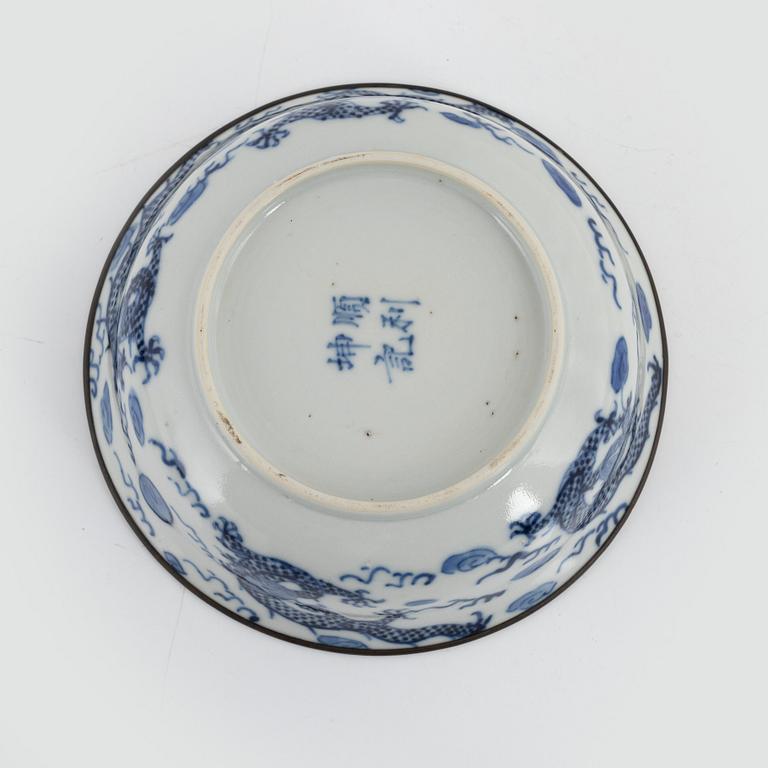 Two blue and white porcelain bowls and a lid, China, Ming dynasty and late Qing dynasty.