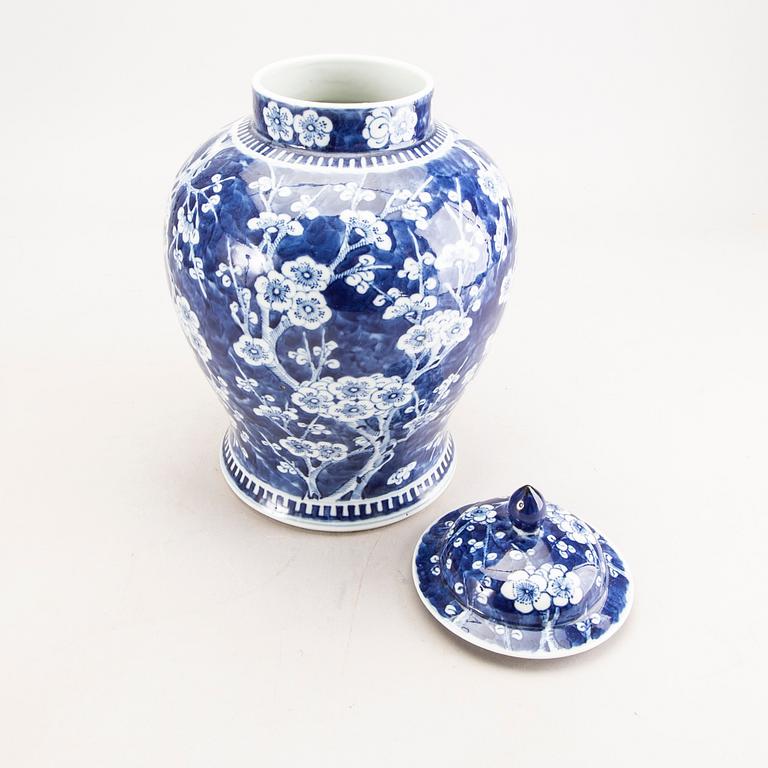 A Chinese 20th century porcelain blue and white urn with lid.