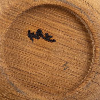 Magnus Ek, a set of three wood and silver snacks holders for Oaxen Krog.