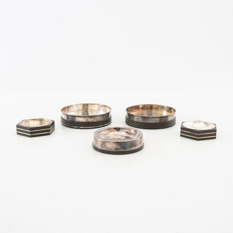 Salt cellars 1 pair and bottle coasters 3 pcs GAB Stockholm 1937, 1938 and 1955 silver and bakelite.