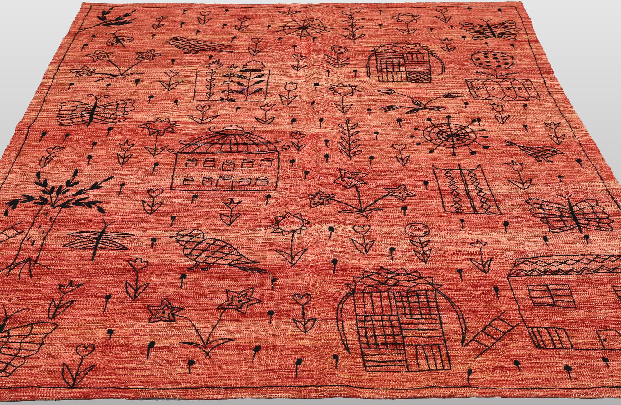 A hand-embroidered Kilim rug, approx. 209 x 171 cm.