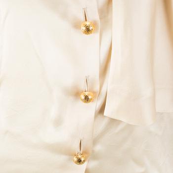 YVES SAINT LAURENT, tied blouses, 2 pieces, french size 40.