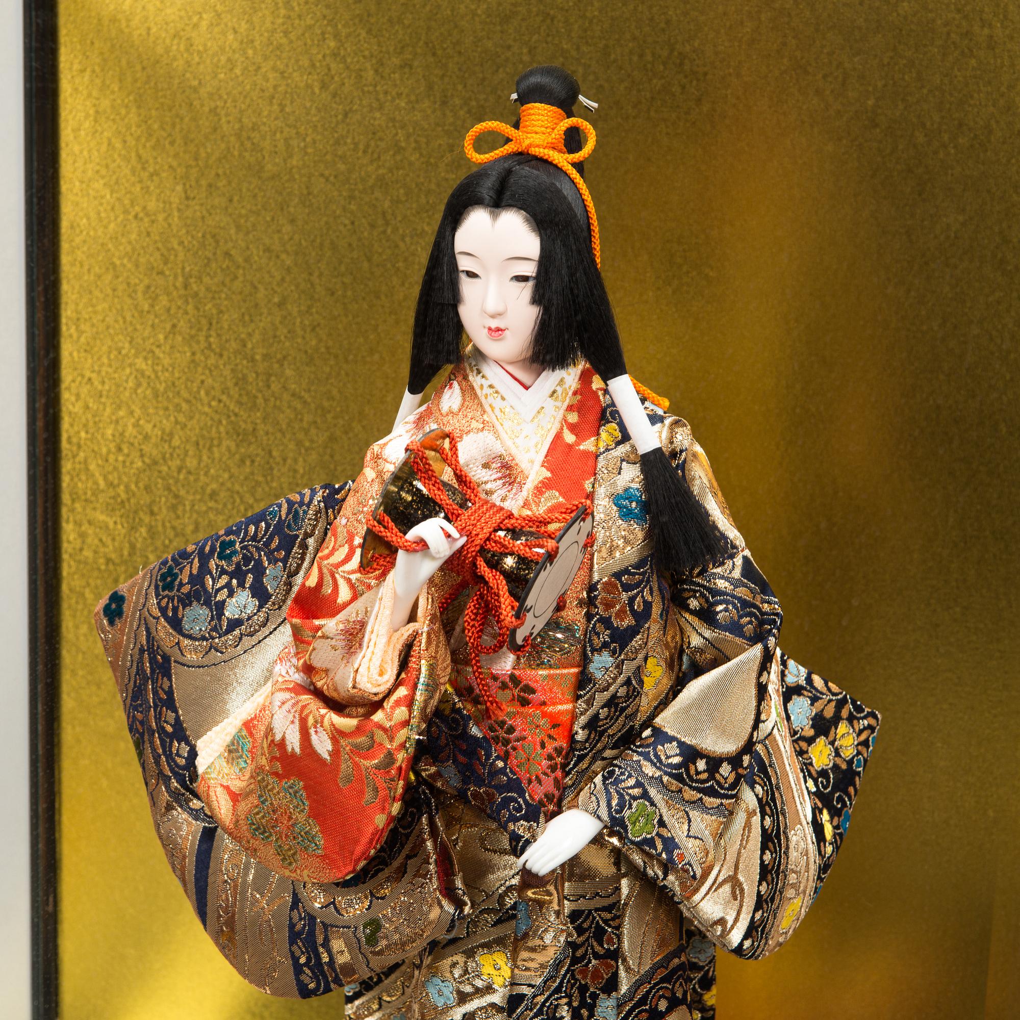 Four late 20th century Japanese dolls.