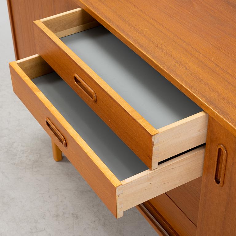 A 1950's/60's teak veneered sideboard.