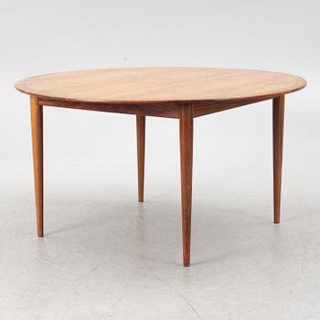 Niels Otto Møller, a rosewood dining table and eight rosewood chairs, Poul Jeppesen & JL Möller, Denmark, 1960's.