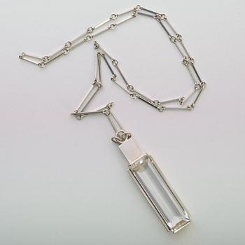 A Wiwen Nilsson sterling facet cut rock crystal pendant and chain, Lund 1933.