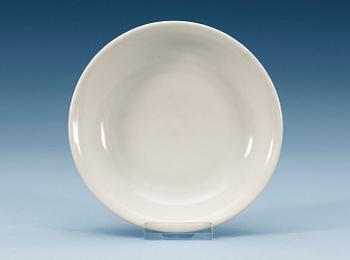 A white-glazed dish, Ming dynasty, with Xuandes six character mark and period (1426-35).