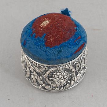 Tiffany & Co, a silver plated box with pin cushion lid.